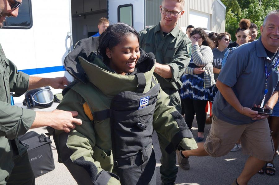 You da Bomb! Nevaeh Prunty, senior, dons an explosion-protective outfit worn by bomb squad police during Mr. Barabas Criminology class on September 12.
