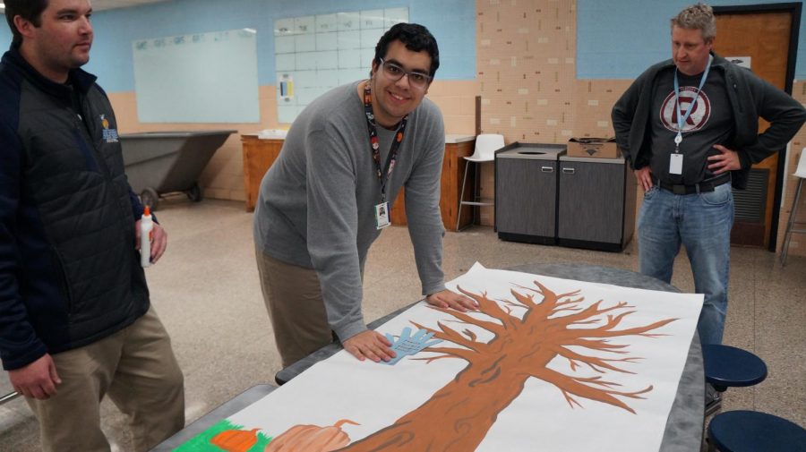 Diego Diaz Deleon, 12, adds the first leaf to the Inclusion Clubs Things we are Grateful For tree
