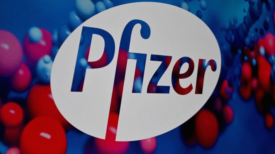 The+Pfizer+logo+is+seen+at+the+Pfizer+Inc.+headquarters+on+December+9%2C+2020+in+New+York+City.+%28Photo+by+Angela+Weiss+%2F+AFP%29+%28Photo+by+ANGELA+WEISS%2FAFP+via+Getty+Images%29