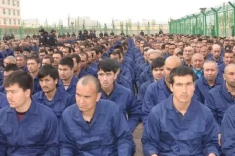 Government social media post in April 2017 shows detainees in a camp in Hotan Prefecture [Image obtained by HRW] Credit: Al Jazeera