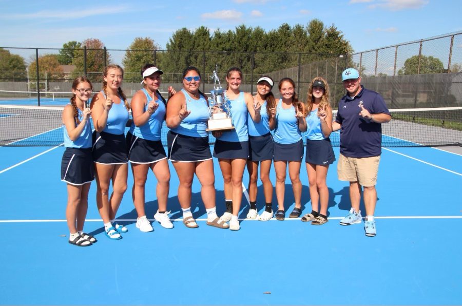 Girls' Varsity team wins trophy at conference
