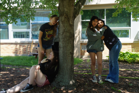 Its hot! Students hide in the shade from the hot summer sun. (photo illustration) From right to left: Hailey Karsten, Abby Rabon, Adelyn Arreguin, Julissa Espejo