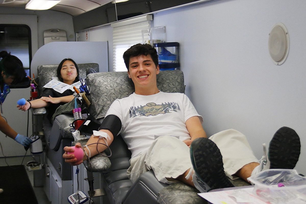 Blake Calcione, 12, getting his blood drawn for the blood drive